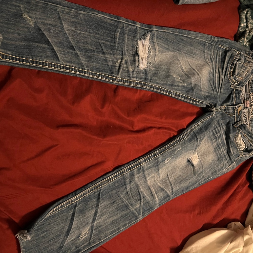 distressed denim jeans